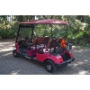 MotoEV 4 Passenger Forward Facing Street Legal Golf Cart back-left angle red