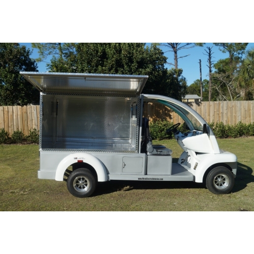 MotoEV Electro Bubble Buddy LSV 2 Passenger Enclosed Utility Deluxe right angle right side open 
