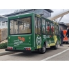 MotoEV Electro Transit Buddy 9 Passenger Hard Door Shuttle custom green back angle