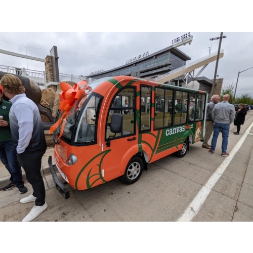 MotoEV Electro Transit Buddy 9 Passenger Hard Door Shuttle custom orange-green outside