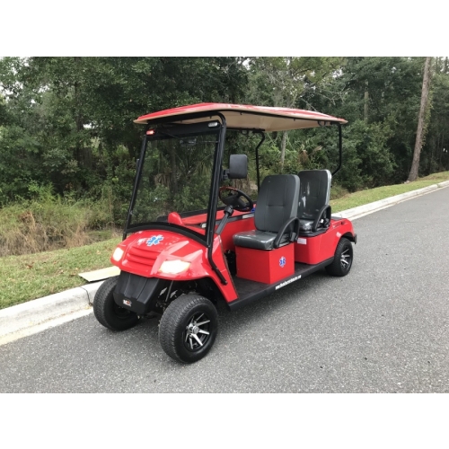 MotoEV Electro Neighborhood Buddy 3 Passenger EMS Street Legal Golf Cart outside